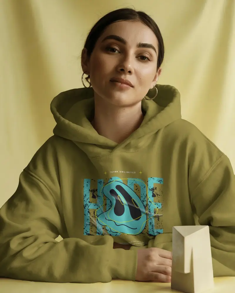 Lifestyle Hoodie Mockup Model With Geometric Prop On Yellow Backdrop