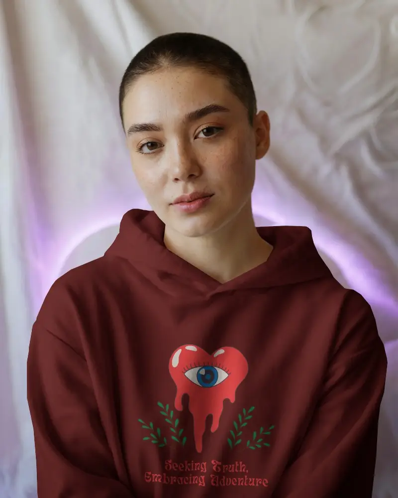 White Hoodie Mockup Female Model With Buzzcut In Soft Glow Lighting Against Draped Fabric Background Calm Expression Modern Minimal Vibe