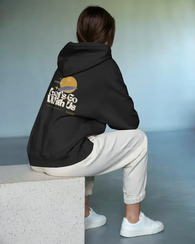Seated Back View Hoodie Mockup Female Model In White Hoodie And Casual Sweatpantsv