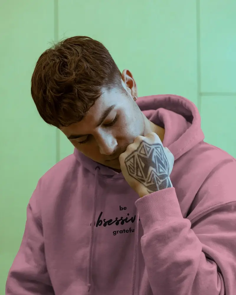 Indoor Hoodie Design Showcase With Young Man And Artistic Tattoos