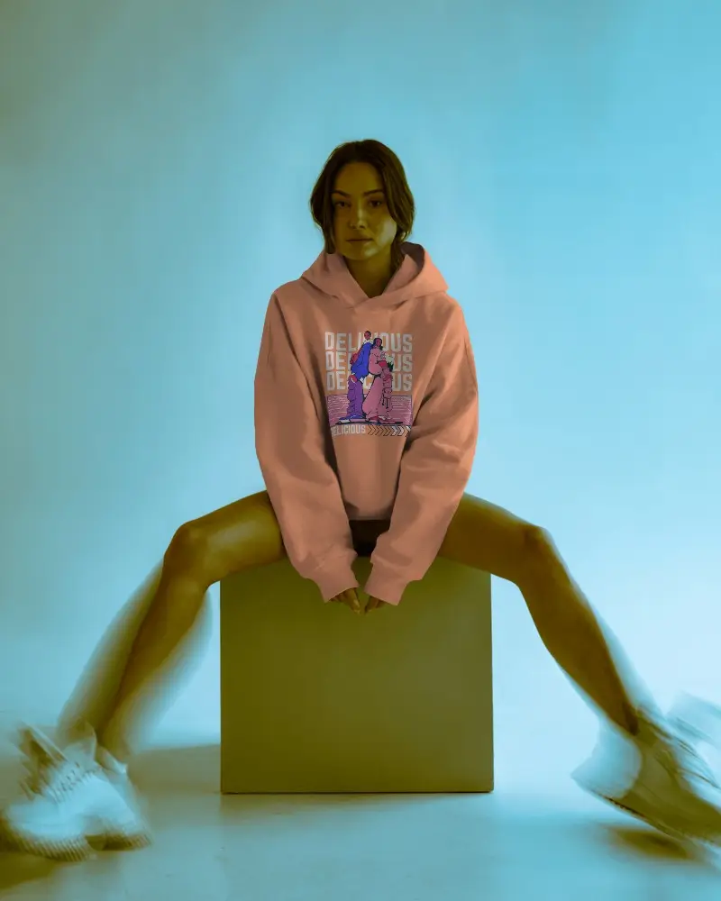 Motion Blur Hoodie Mockup With Female Model Sitting On Cube