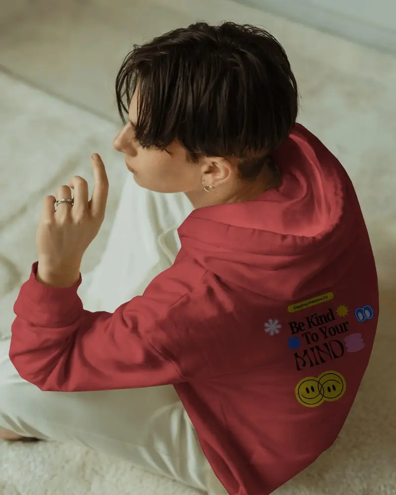 Casual Indoor White Hoodie Mockup Female Model Sitting On Cream Carpeted Floor In Soft Natural Light Modern Style 0702