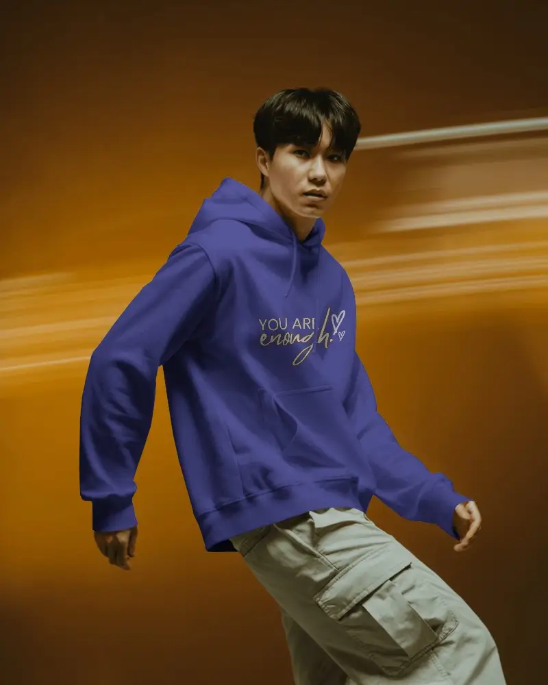 Bold Motion Hoodie Mockup Male Model In White Hoodie With Cargo Pants Against Orange Blur Background Dynamic Style 0706