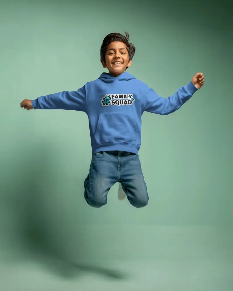 Kids Hoodie Mockup Boy Jumping With Smile In White Hoodie On Pastel Green Background Playful And Joyful Mood 0707