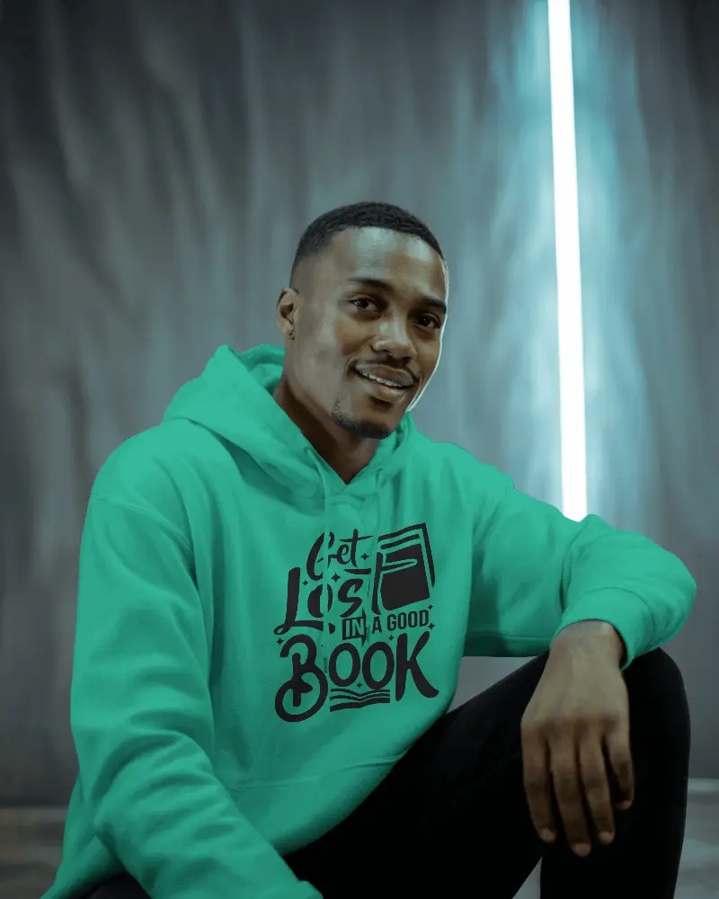 Seated Male Model Hoodie Mockup Under Glowing Blue Strip Light