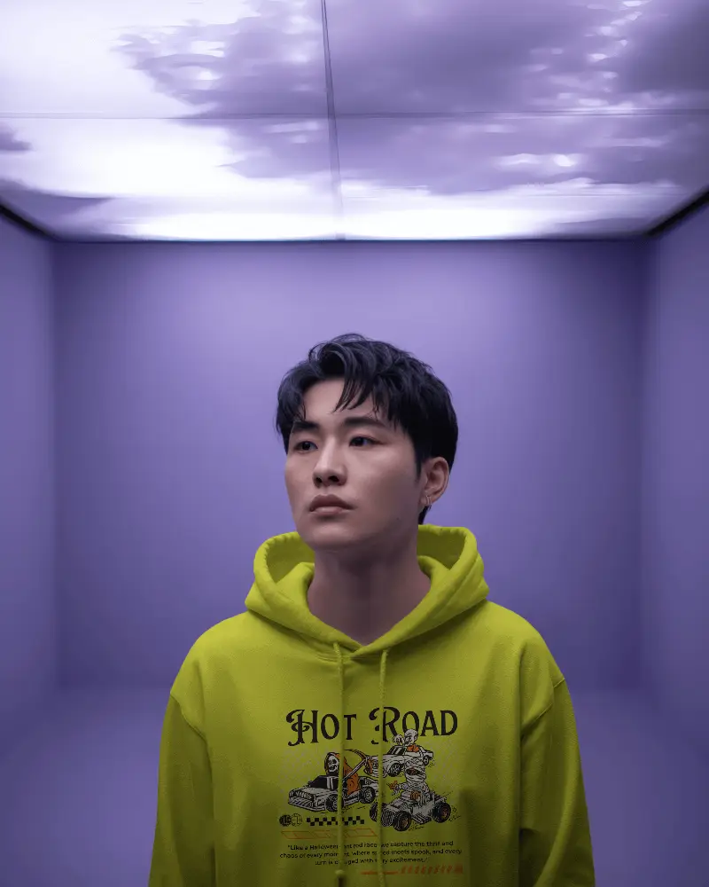 Modern Purple Interior Hoodie Mockup Male Model Under Cloud Ceiling