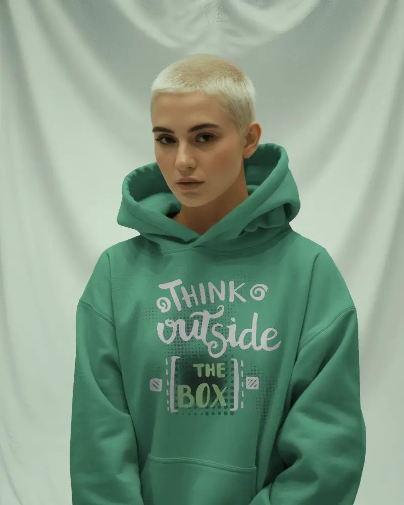 Soft Fabric Backdrop Hoodie Mockup Female Model With Buzzcut Hair