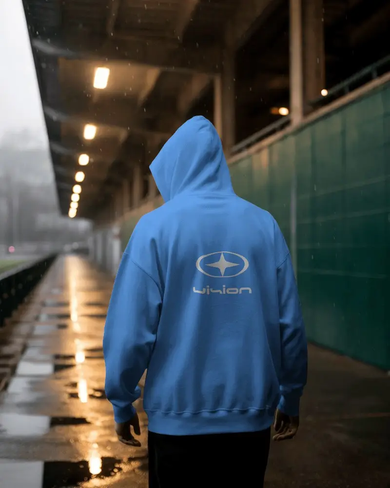 Rainy Evening Hoodie Mockup Male Model Facing Away Under Covered Walkway Reflective Wet Surface 0788