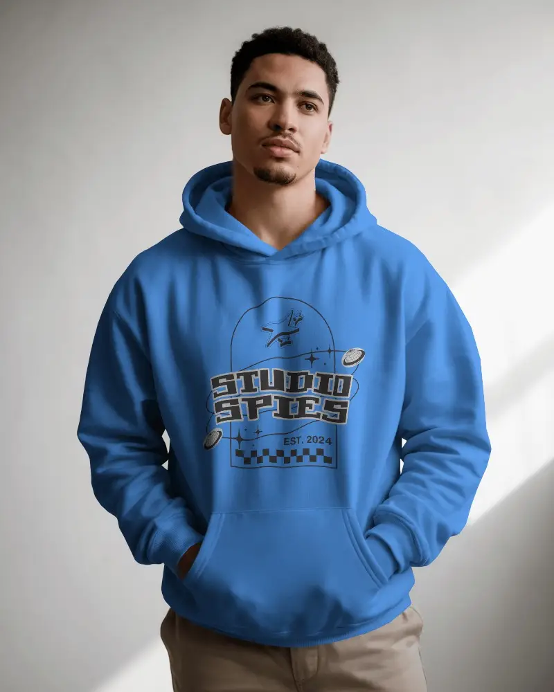 Natural Light Hoodie Mockup Male Model Standing In Soft Shadowed Studio With Hands In Pockets 0799