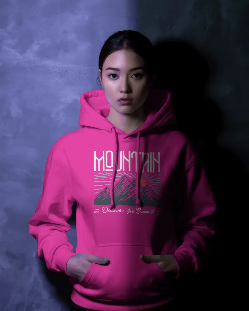 Cinematic Light Hoodie Mockup Model Standing Still Against Blended Textured Interior Wall