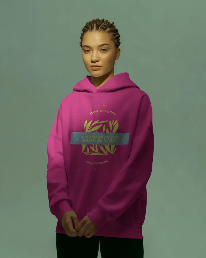 Contemporary Fashion Hoodie Mockup Against Pastel Backdrop With Female Model
