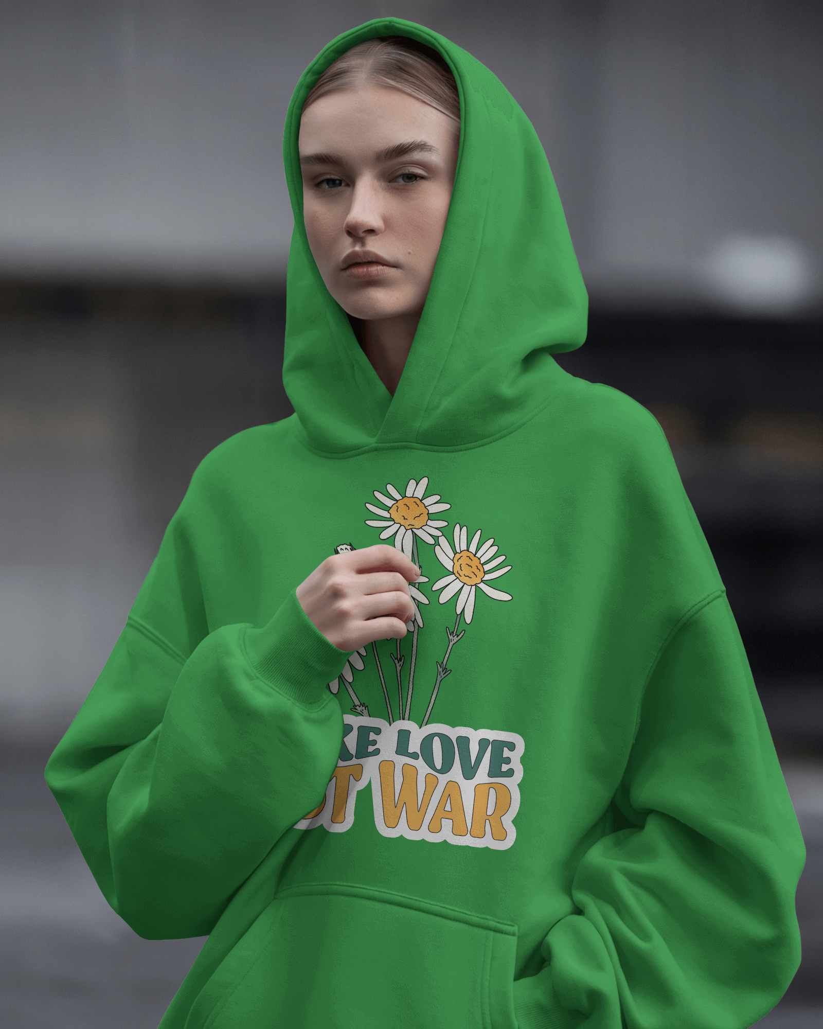 Moody Streetwear Hoodie Mockup Female Model In Oversized Hoodie With Intense Expression Urban Gray Backdrop Edgy And Modern Vibe