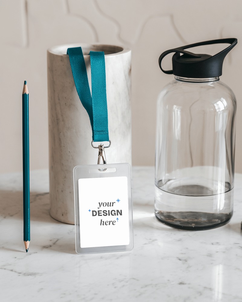 Id Card Mockup Transparent Holder With Blue Lanyard On Marble Surface Alongside Pencil Vase And Water Bottle Modern And Minimalist Setup 020