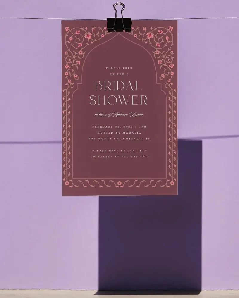 Minimal Invitation Card Mockup Held With Clip Against Vibrant Wall With Realistic Shadow