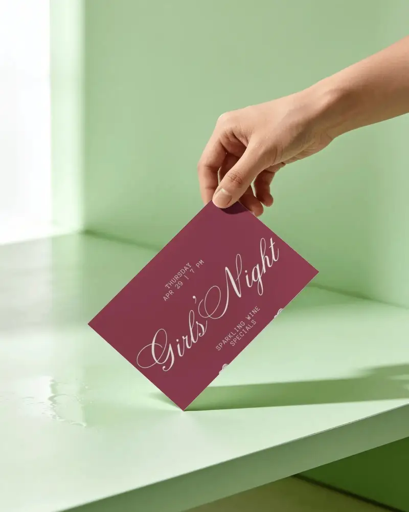 Hand Holding Invitation Card Mockup Over Flat Minimalist Surface For Clear Presentation