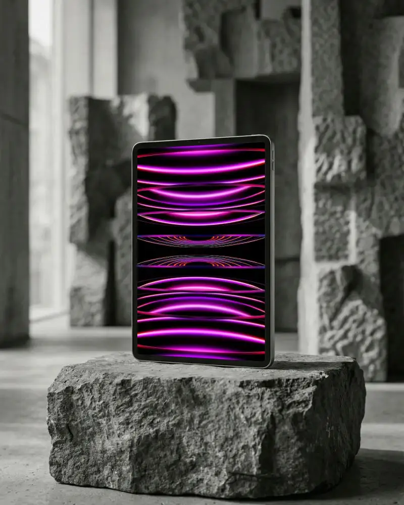 Modern Ipad Pro Mockup Standing On Rough Stone Platform In Industrial Space Background