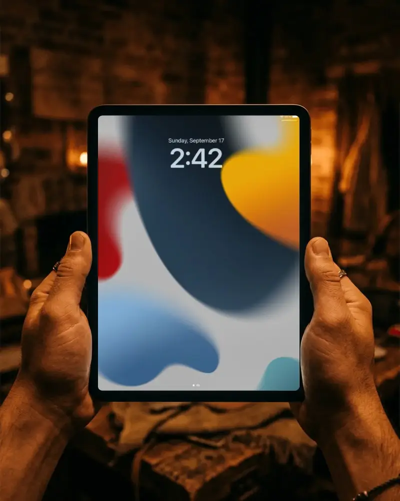 Hand Holding Ipad Air Mockup For Digital Content Display And App Presentation
