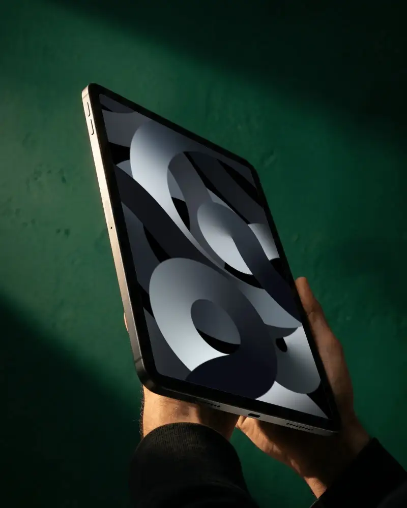 Person Holding Ipad Air Mockup Angled View Modern Tablet Device Mockup In Hand