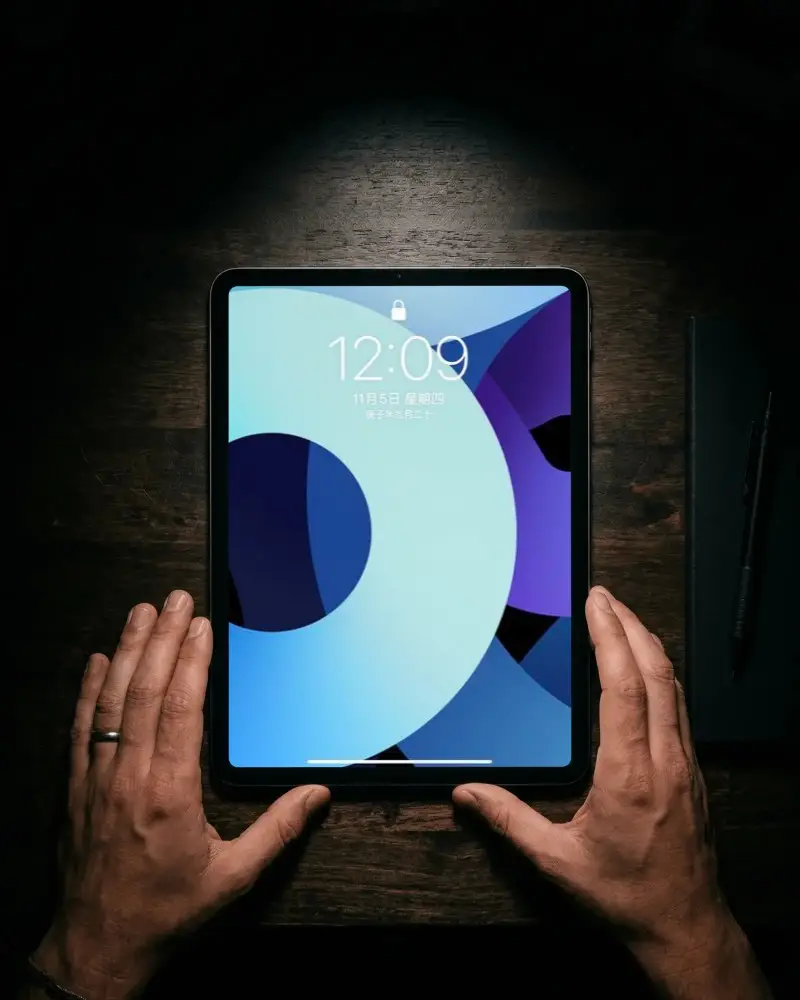 Top View Ipad Air Mockup Over Dark Rustic Wooden Surface For Design Display