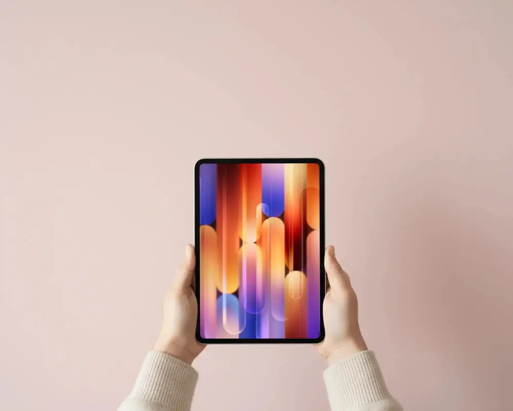 Hands Holding Digital Ipad Mini Mockup On Solid Background For App Showcase