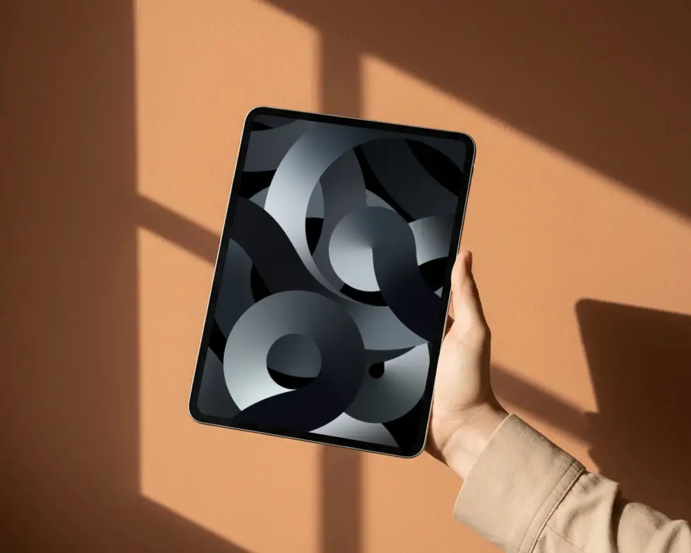 Hand Holding Ipad Air Mockup In Minimalist Background For Mockup Design