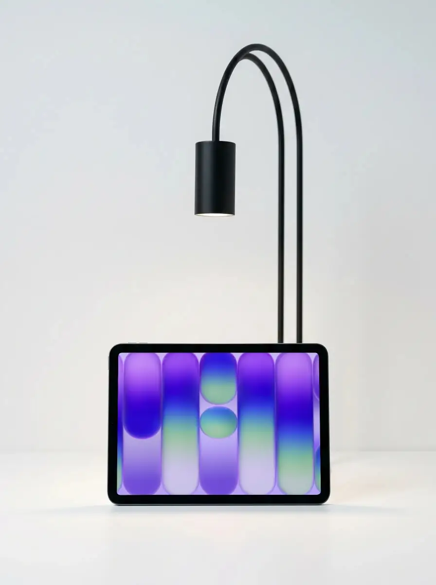 High Resolution Ipad Mini Mockup Showcasing Blank Screen Under Contemporary Lamp Light