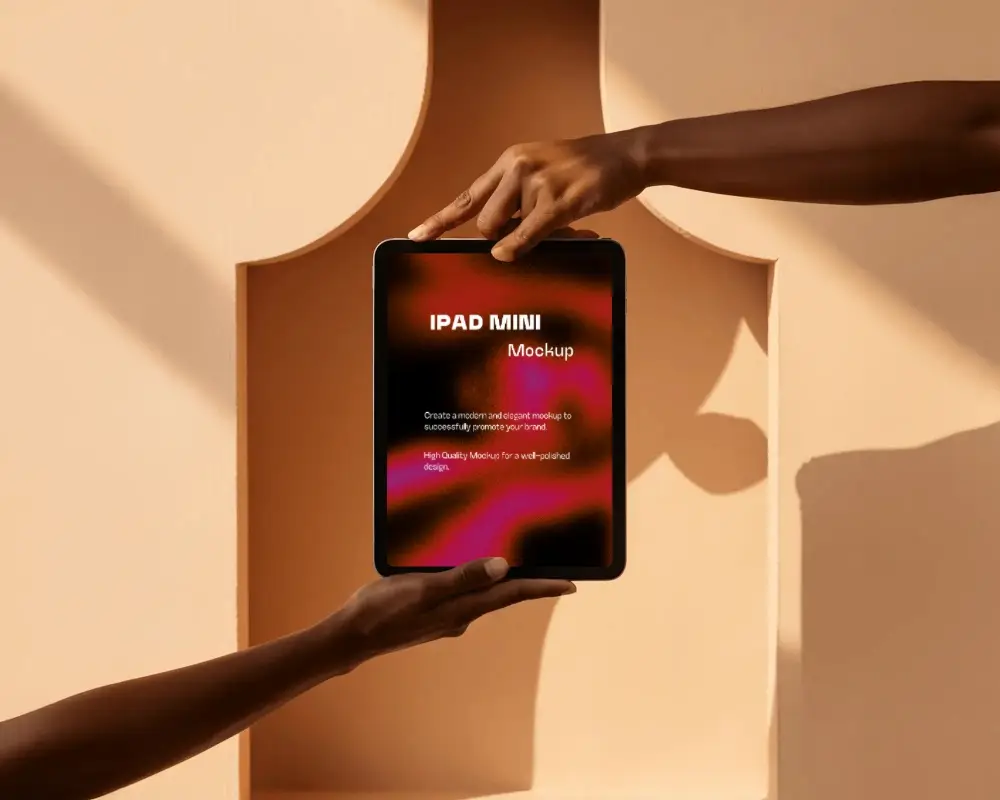 Sunlit Ipad Mini Mockup Framed By Hands In Symmetric Cutout Wall Architecture