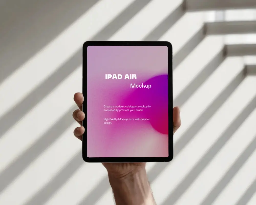 Portrait Ipad Air Mockup Held In One Hand With Crisp Natural Sunlight Pattern