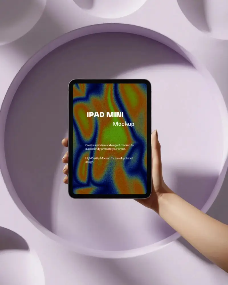 Ipad Mini Mockup Hand Holding Tablet Against Light Purple Sculptural Background