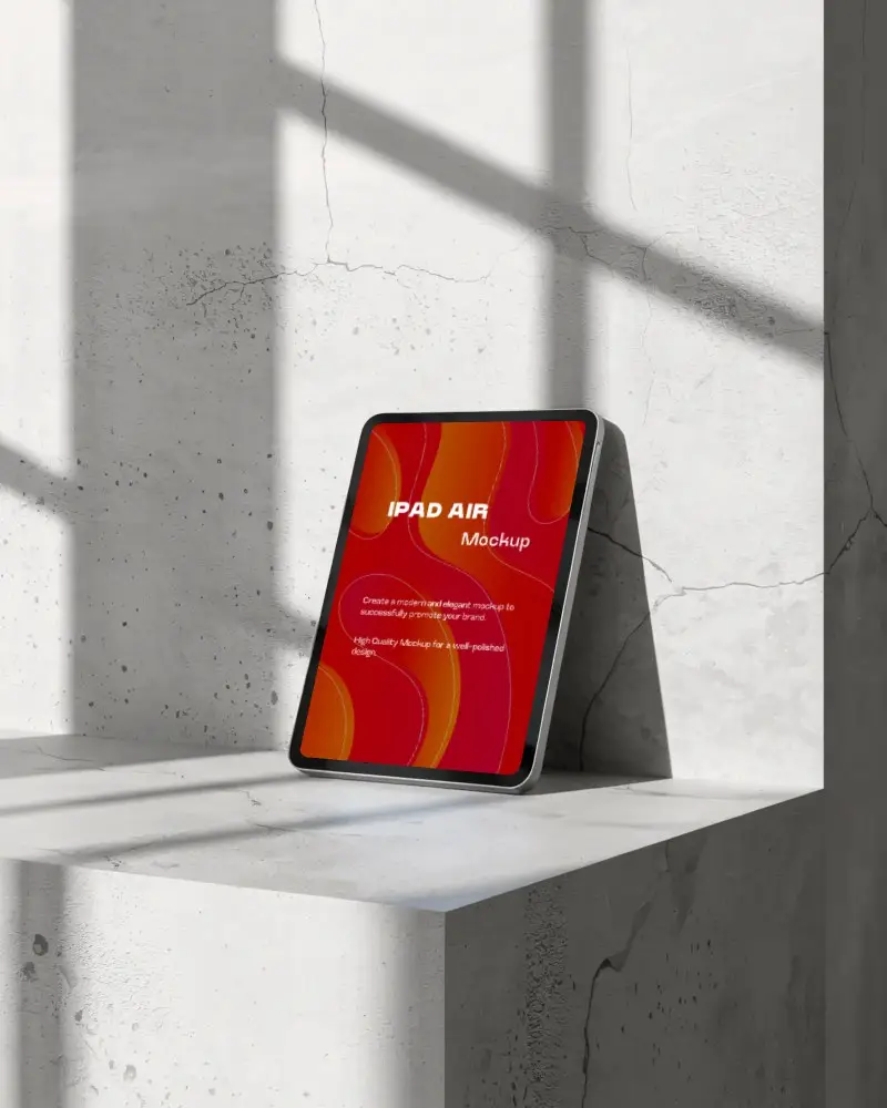 ipad-air-mockup-leaning-on-concrete-surface-in-bright-studio-light-with-window-shadow-lines