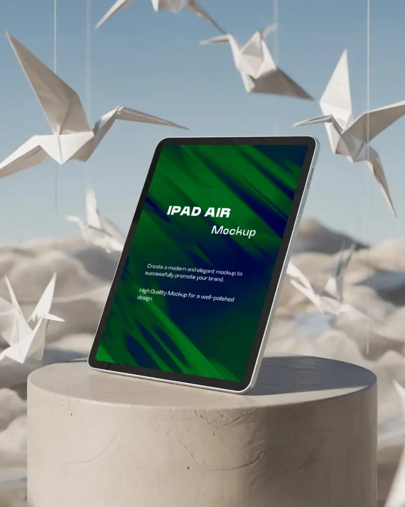 ipad-air-mockup-on-round-pedestal-with-floating-origami-cranes-and-cloudy-mountain-view