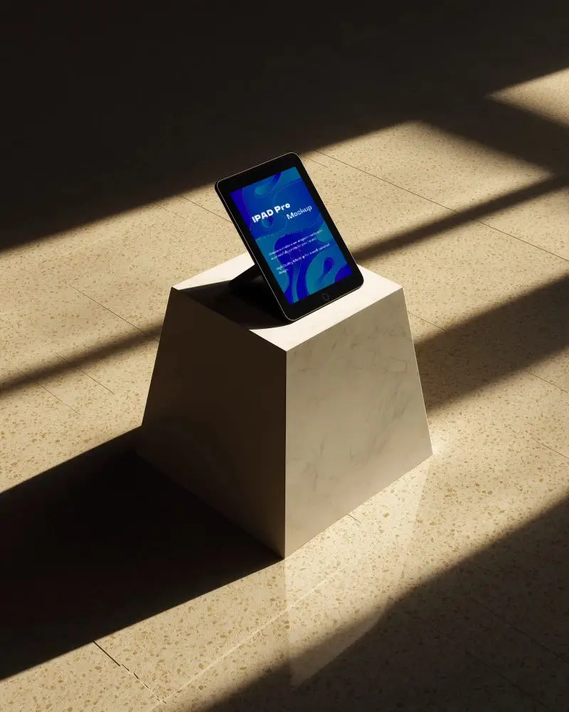 Sleek Ipad Pro Mockup Displayed On Geometric Podium In Sunlit Interior With Contrasting Dark Shadows