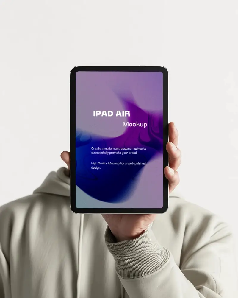 Ipad Air Mockup Held Upright Covering Face Against Clean White Background In Minimal Studio