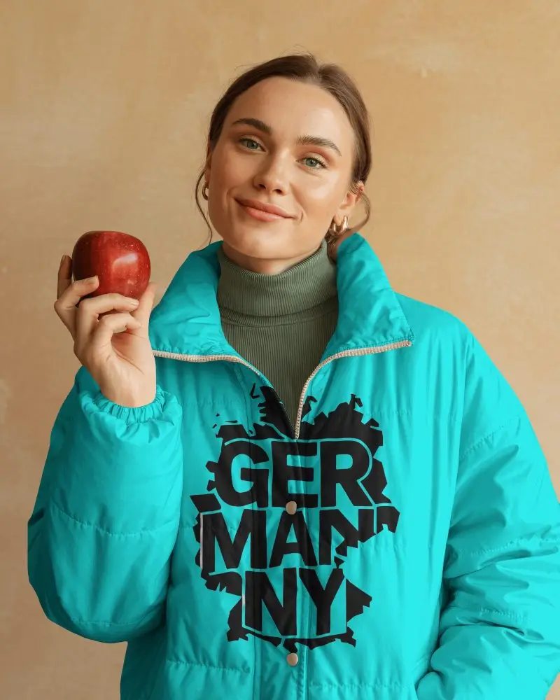 Studio Puffer Jacket Mockup Female Model Smiling Holding Apple Soft Natural Light Fashion Shot