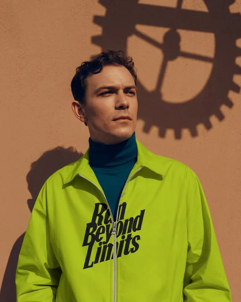 Outdoor Bomber Acket Mockup Male Model Looking Away Sunlit Wall Strong Shadow Fashion Style