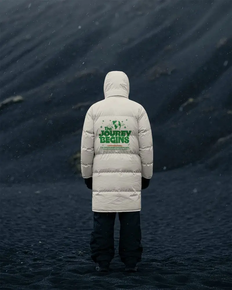 Shadow Dunes Long Puffer Jacket Mockup Hooded Figure Standing In Dark Windy Landscape