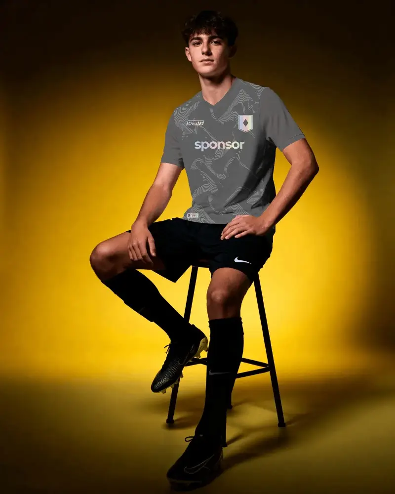 Male Athlete Stylish Sport Jersey Mockup Showcasing Modern Athletic Wear For Soccer Training