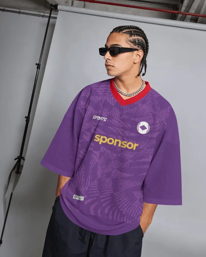 Studio V Neck Jersey Mockup Male Model Wearing Sunglasses In Gray Backdrop Fashion Photoshoot
