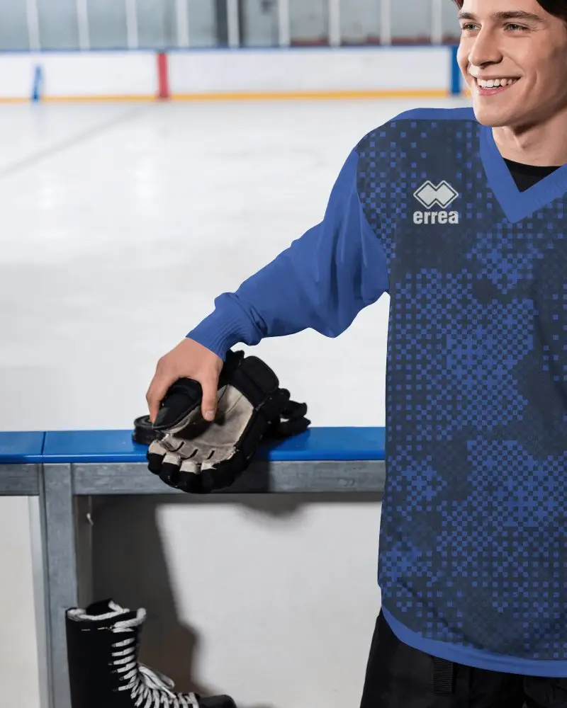 V Neck Ice Hockey Jersey Mockup Male Model Smiling At Rink Side With Gloves And Skates