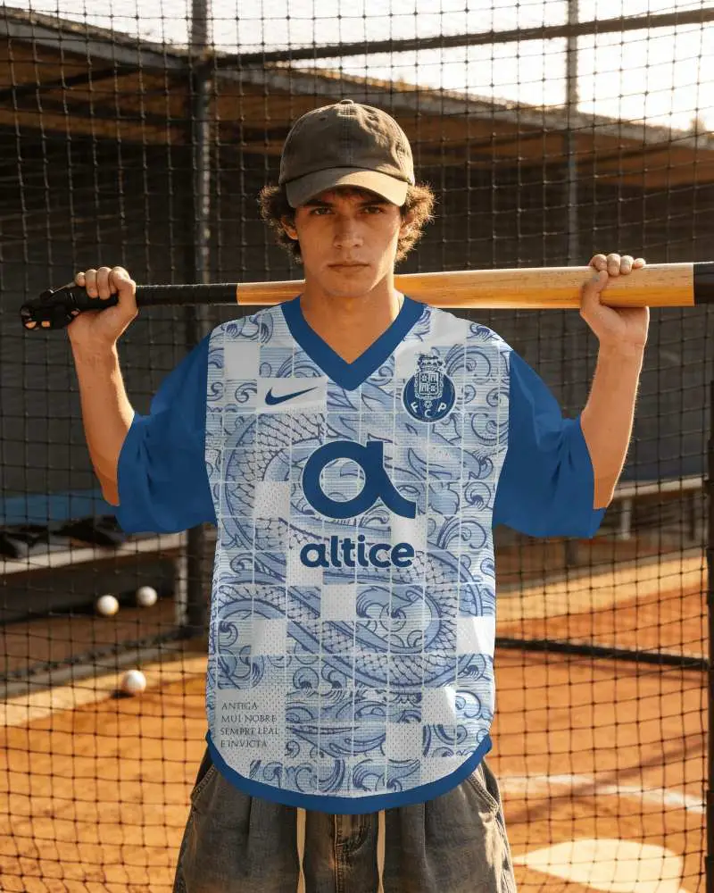V Neck Baseball Jersey Mockup Male Player Holding Bat Behind Neck In Batting Cage