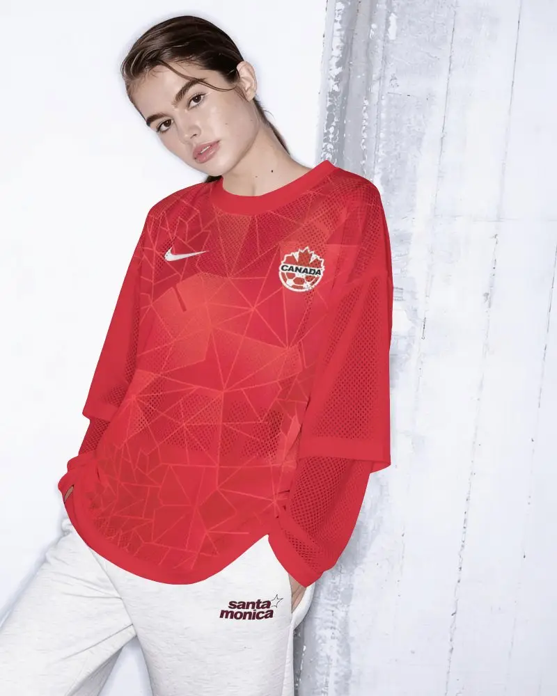Oversized Mesh Jersey Mockup Female Model Leaning Against Distressed White Studio Wall