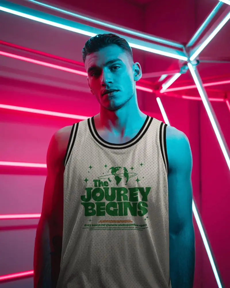 Neon Arena Jersey Mockup With Athlete Framed By Bold Pink And Blue Light Tubes