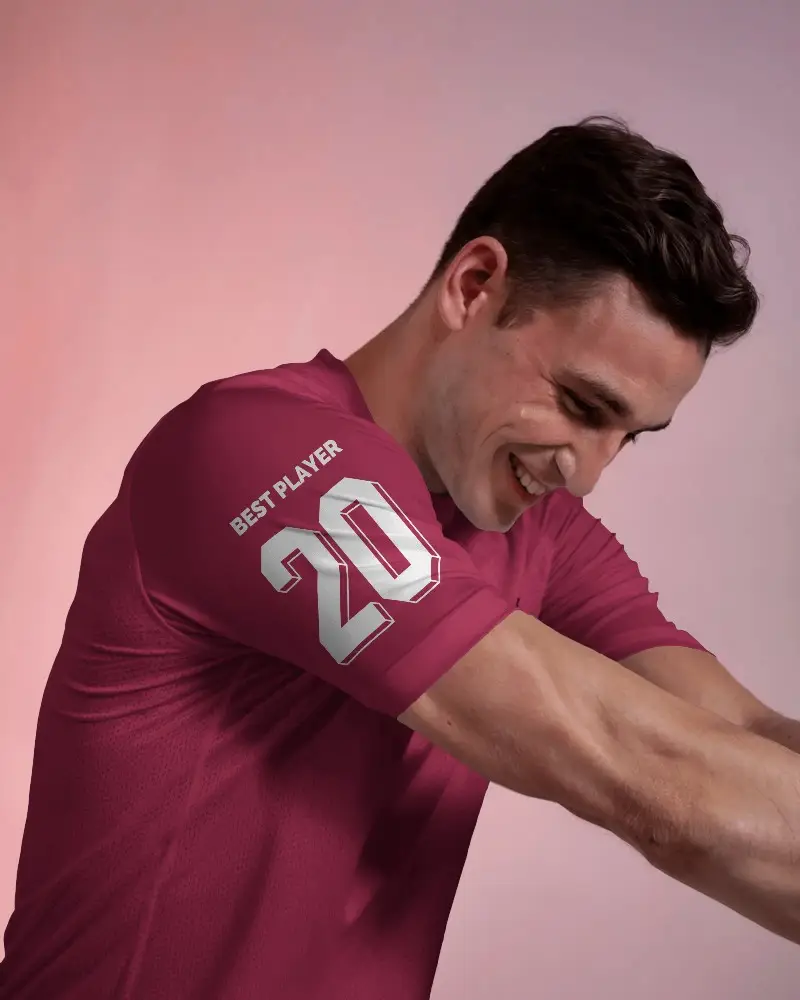 Custom Branding Sports Jersey Mockup On Male Model In Soft Light With Arm Raised For Design Exposure