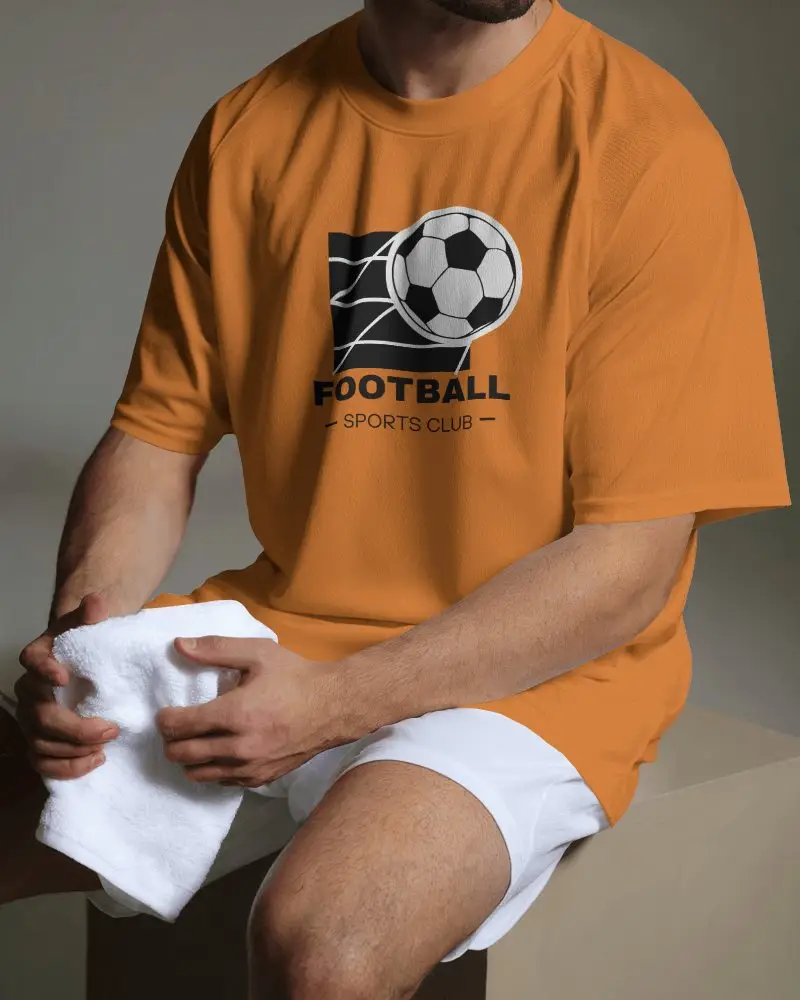 Football Jersey Mockup Male Model Sitting On Bench In Minimal Studio Lighting Holding Towel Casual Athletic Look