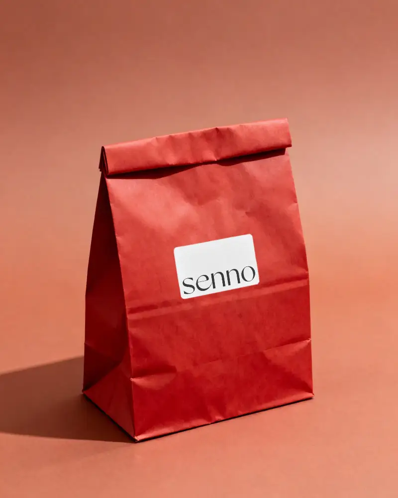 Kraft Paper Lunch Bag With Clear Label Mockup On Plain Background For Custom Design