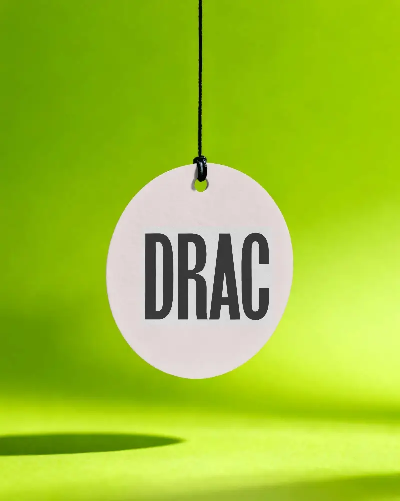 Minimal Round Label Hanging By String On Bright Backdrop For Marketing Packaging Showcase