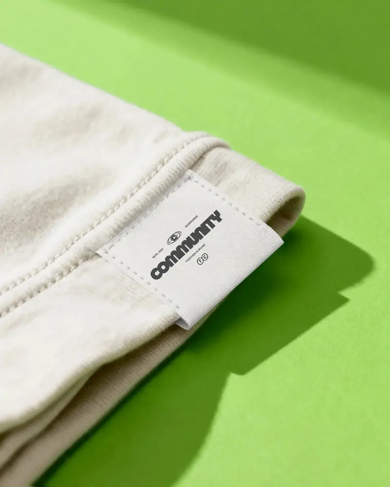 Custom Stitched Fabric Label On Edge Of Clothing Item For Branding And Tagging