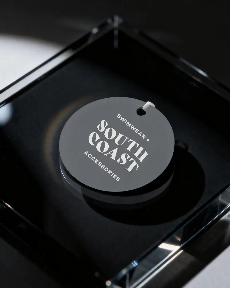 Round Hanging Label Mockup On Transparent Surface For Product Packaging Design Presentation