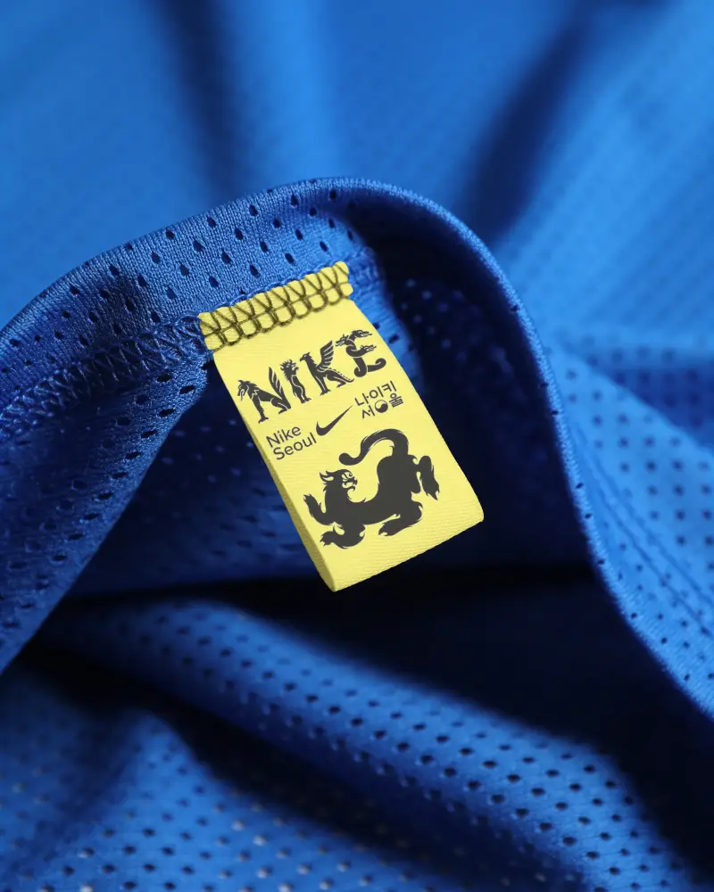 Closeup Soft Fabric Label Mockup On Textured Athletic Wear Branded Garment