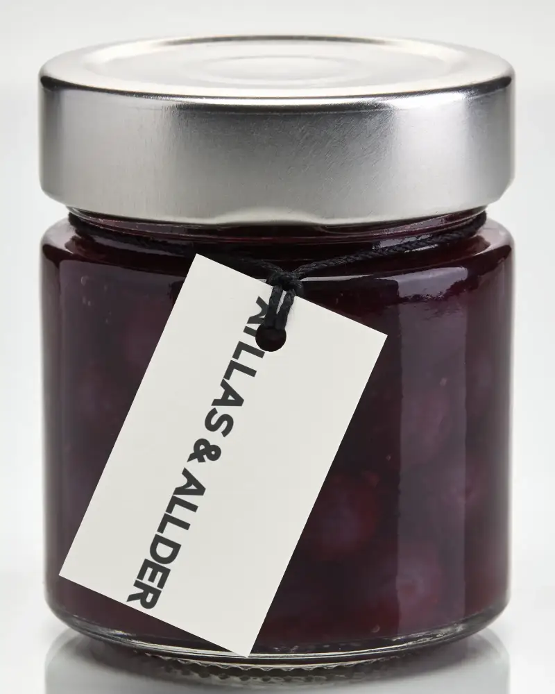 Minimalist Hanging Label Mockup On Glass Container For Artisan Jam Or Preserve Packaging